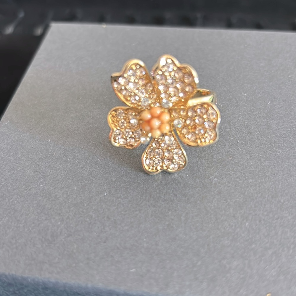 J Crew gold flower statement ring with cubic zirconia and peach coral. Bling